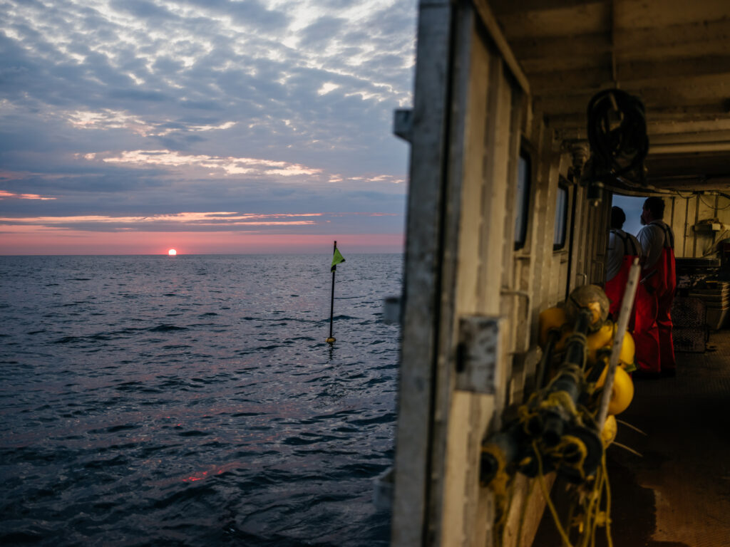 Sun rising over Lake Erie as seen from Tim Martin's commercial fishing boat.